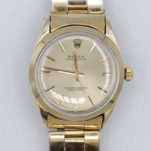 Rolex Oyster Perpetual 1024 Champagne Dial Gold Shell Rivet Band Circa 1969