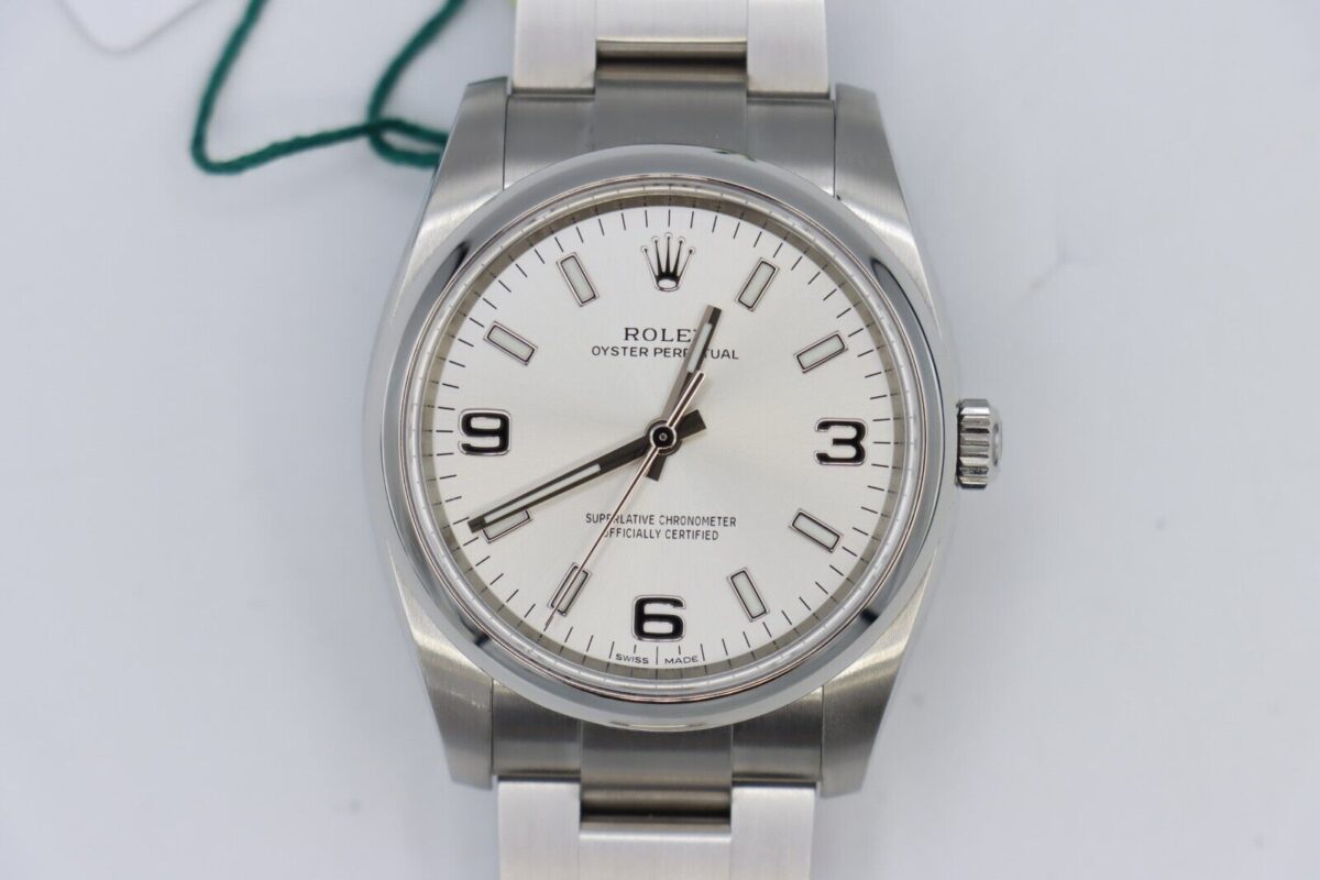 Rolex Oyster Perpetual 114200 Silver Arabic Dial 34mm Box & Papers Year 2017